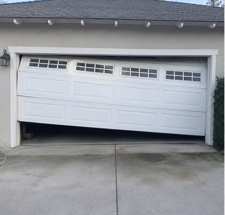 Garage door before service